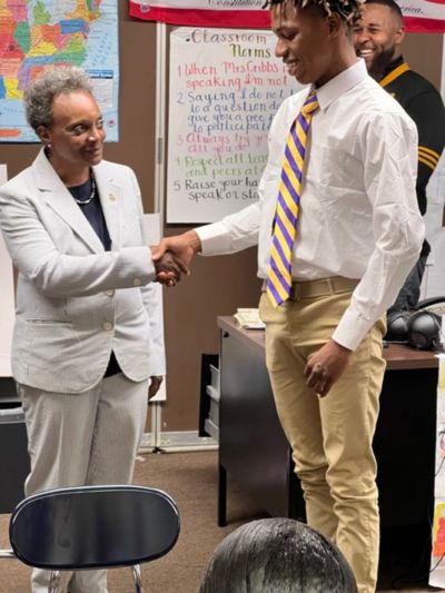 Mayor Lightfoot and Excel student Alonso Sable