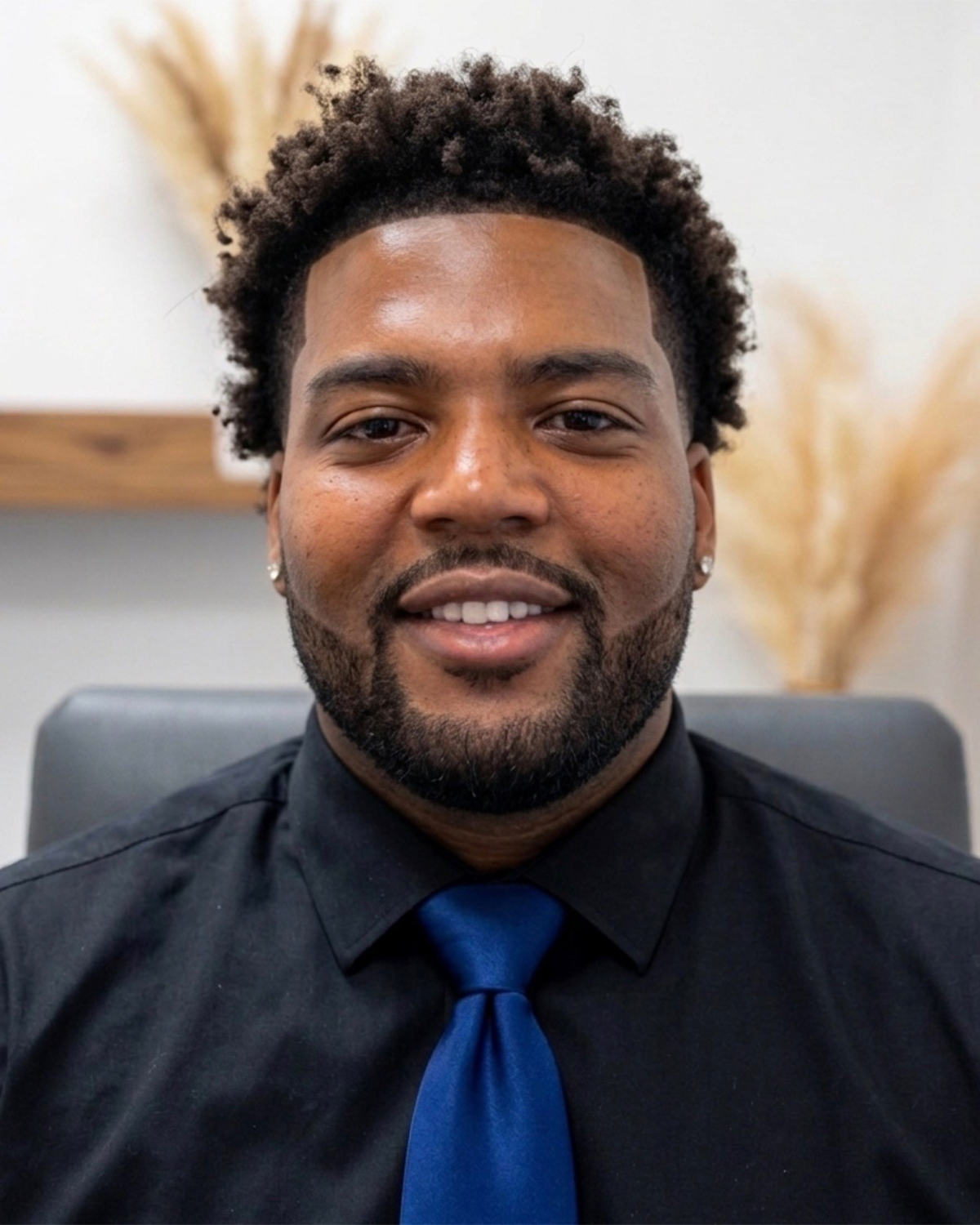 DM-Headshot-associate director