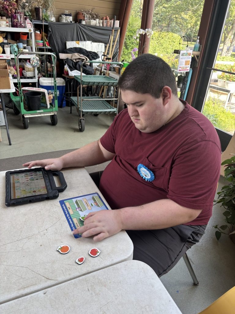 Nicholas transition to adult day program Tablet work