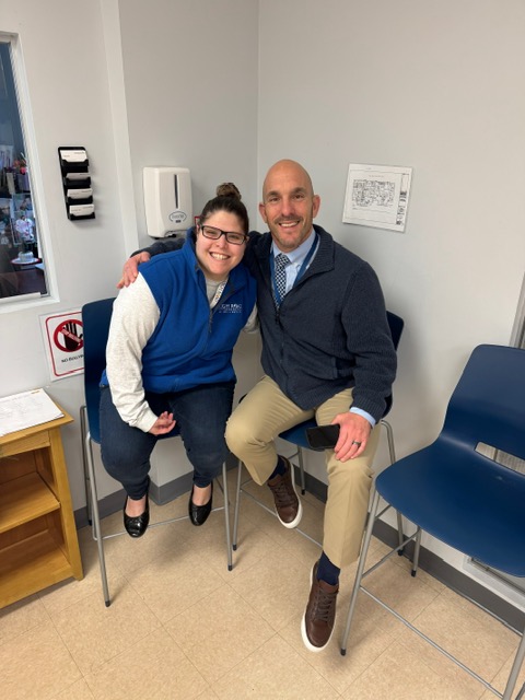 Veteran educator Vincent Lindsley with christine