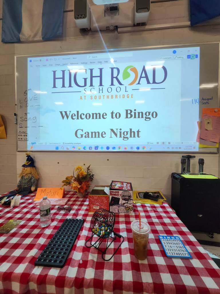High Road and West Street staff hosting Family Game Night in Southbridge cafeteria