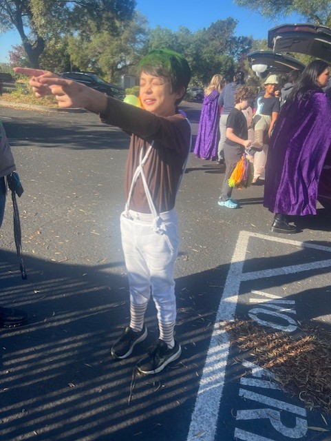 Student dressed as an Oompa Loompa during the Harvest Festival costume parade