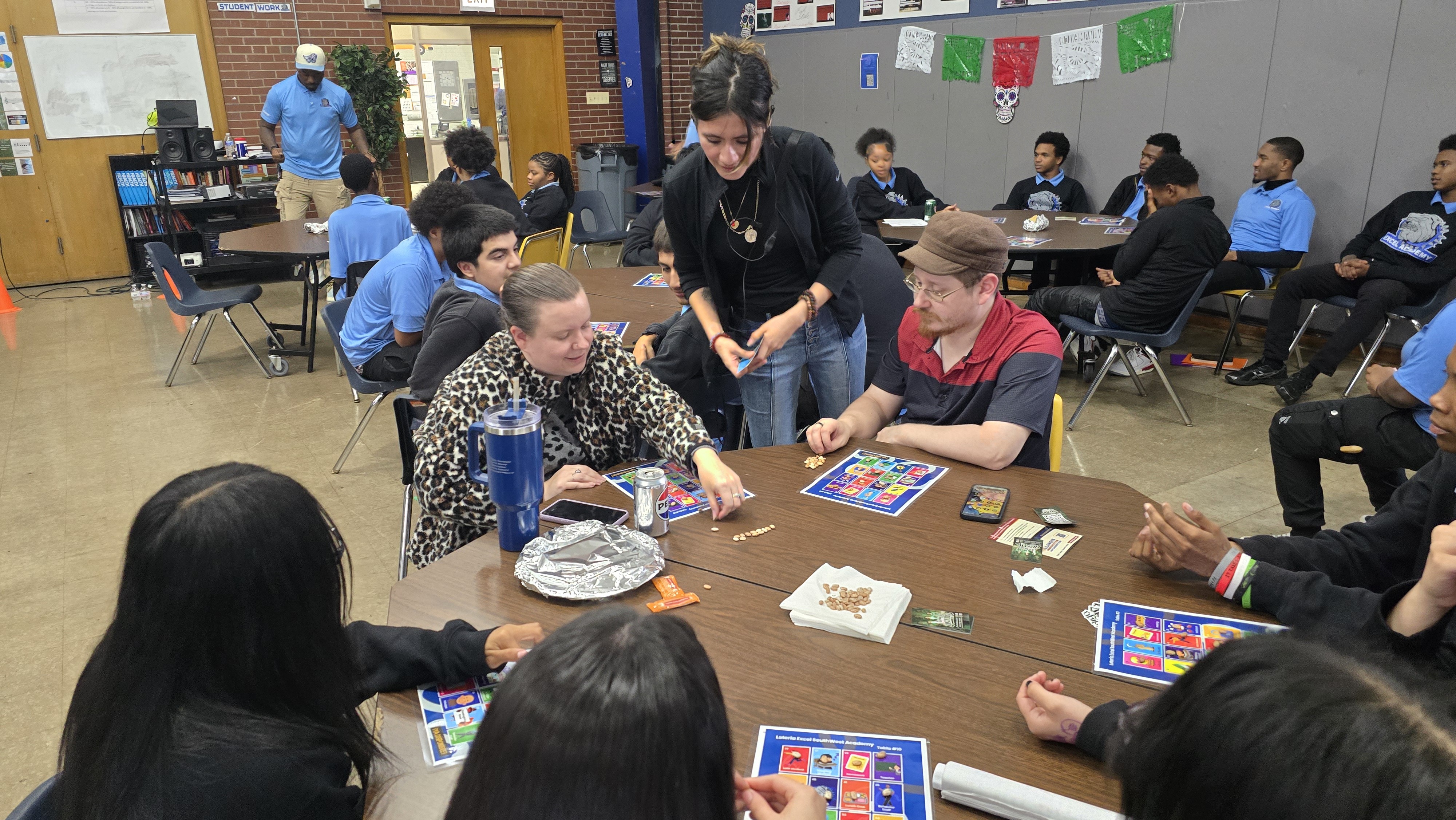 Behavior specialist working with students in a classroom at Excel Academy