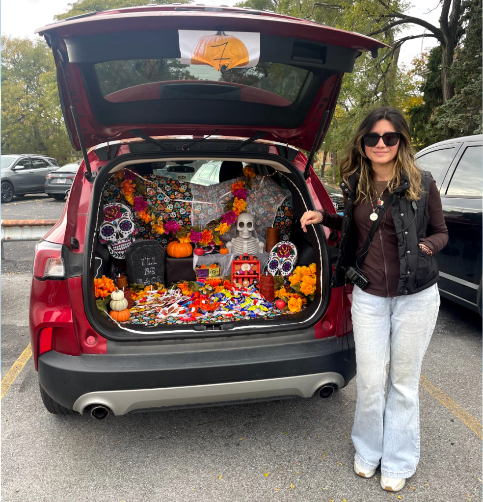 Behavior specialist leading cultural celebration at Excel Academy