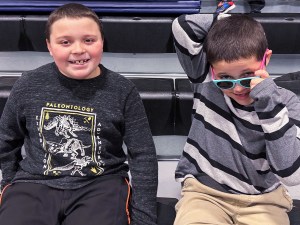 Aiden and Sebastian celebrating progress together at High Road School