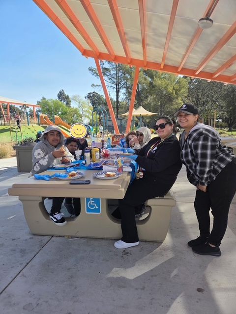 Sierra School of Solano County students and staff having lunch during field trip
