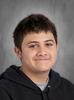 Student Ruben posing for a portrait at Sierra School of Sacramento representing a student success story of growth and confidence