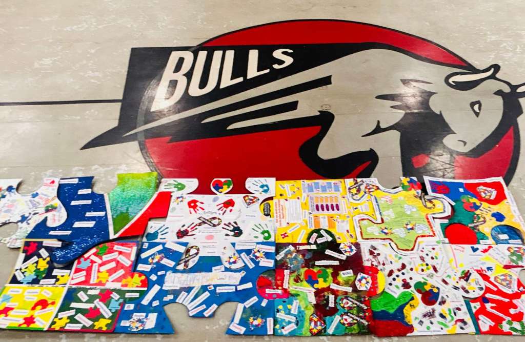 Student-created artwork displayed during Autism Awareness Month at Excel Academy