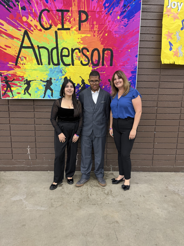 Sierra School at San Bernardino City student and staff smiling at district prom event