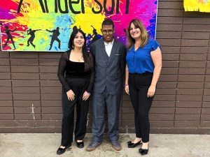 Sierra School at San Bernardino City student and staff smiling at district prom event
