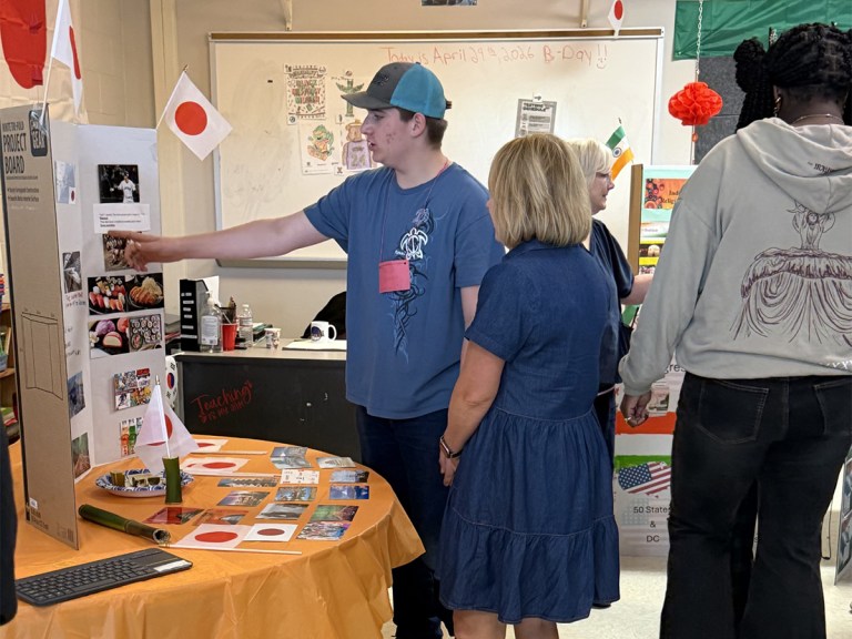 Students and staff interacting during International Day celebrations inside the classroom at High Road School at St. Mary’s County.