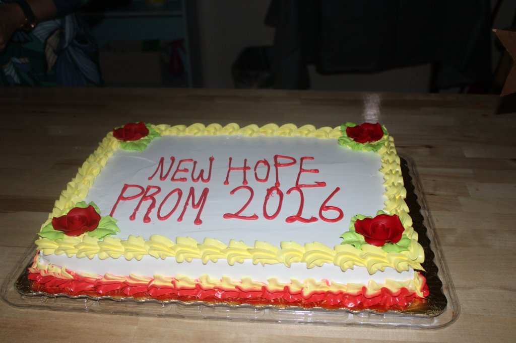 Prom cake displayed during the 70s themed celebration at NewHope Academy.