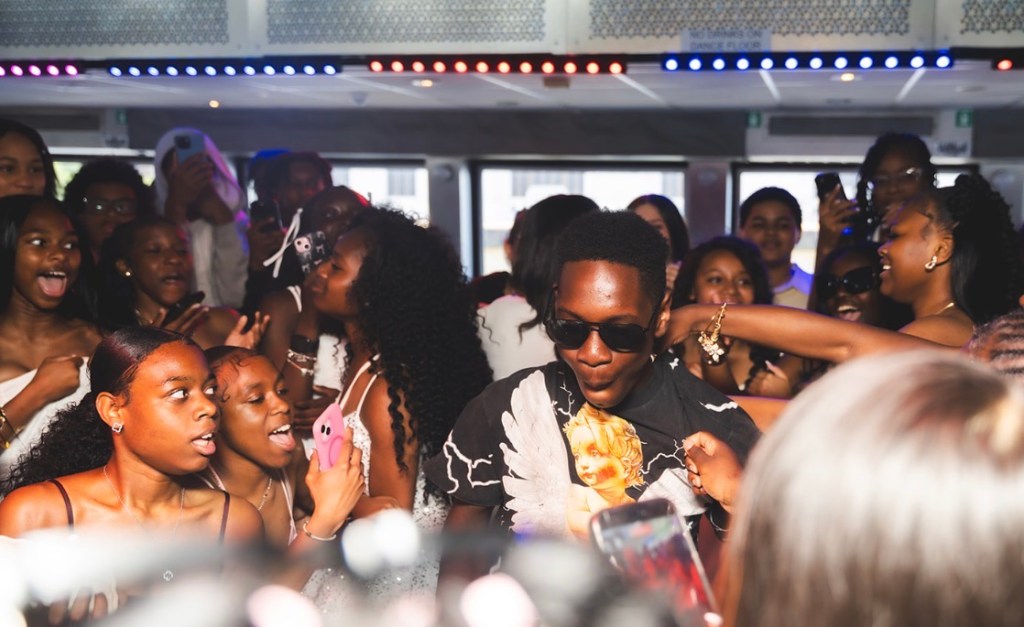 Students dancing and celebrating during the eighth grade luncheon aboard the Spirit of Philadelphia.