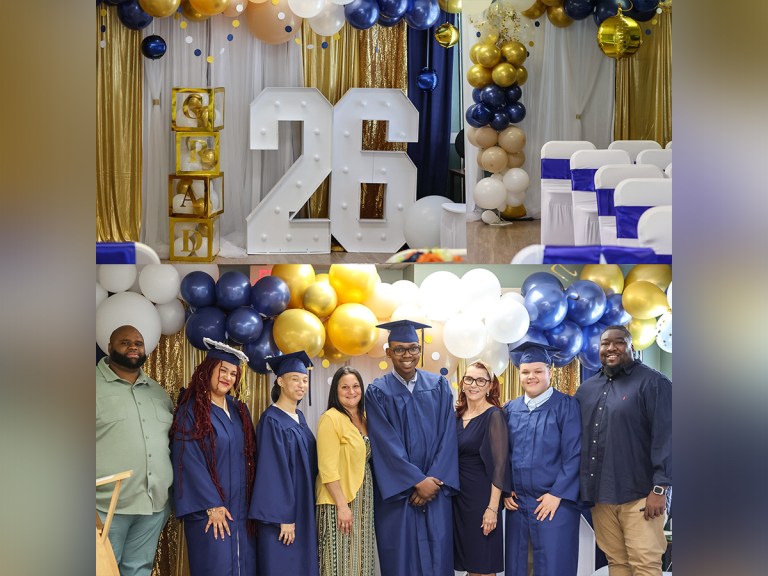 Graduating seniors, school staff and supporters pose for a group photo during the High Road School of Massachusetts Class of 2026 celebration.