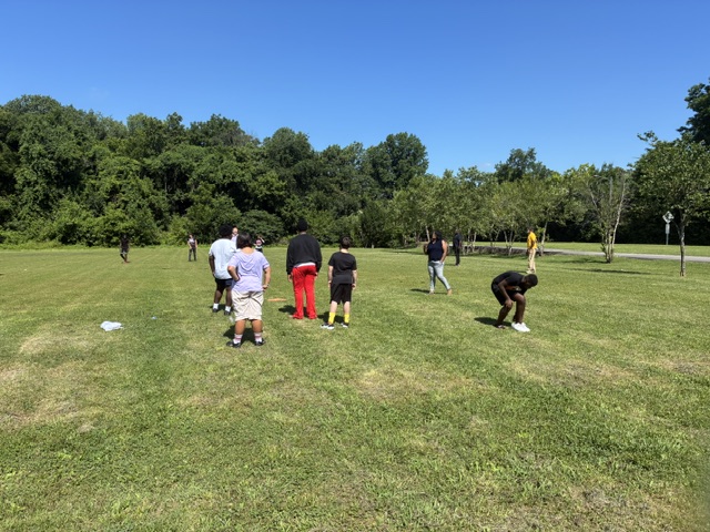 High Road School of Nashville students and staff gather in a park during an ESY field trip.