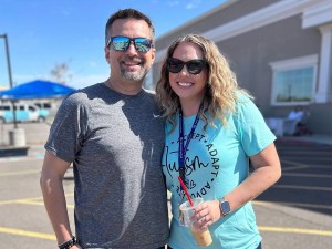Jessica Gilmore standing with a colleague outside during a Sierra Schools of Arizona school event.