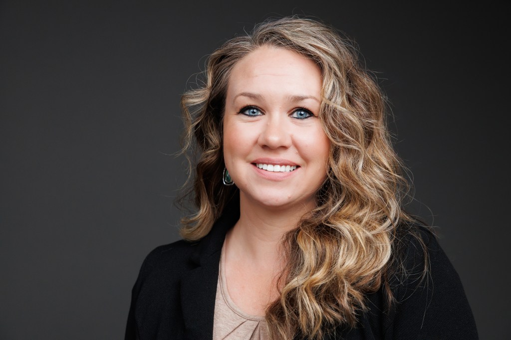 Jessica Gilmore, regional director for Sierra Schools of Arizona, smiling in a professional headshot.