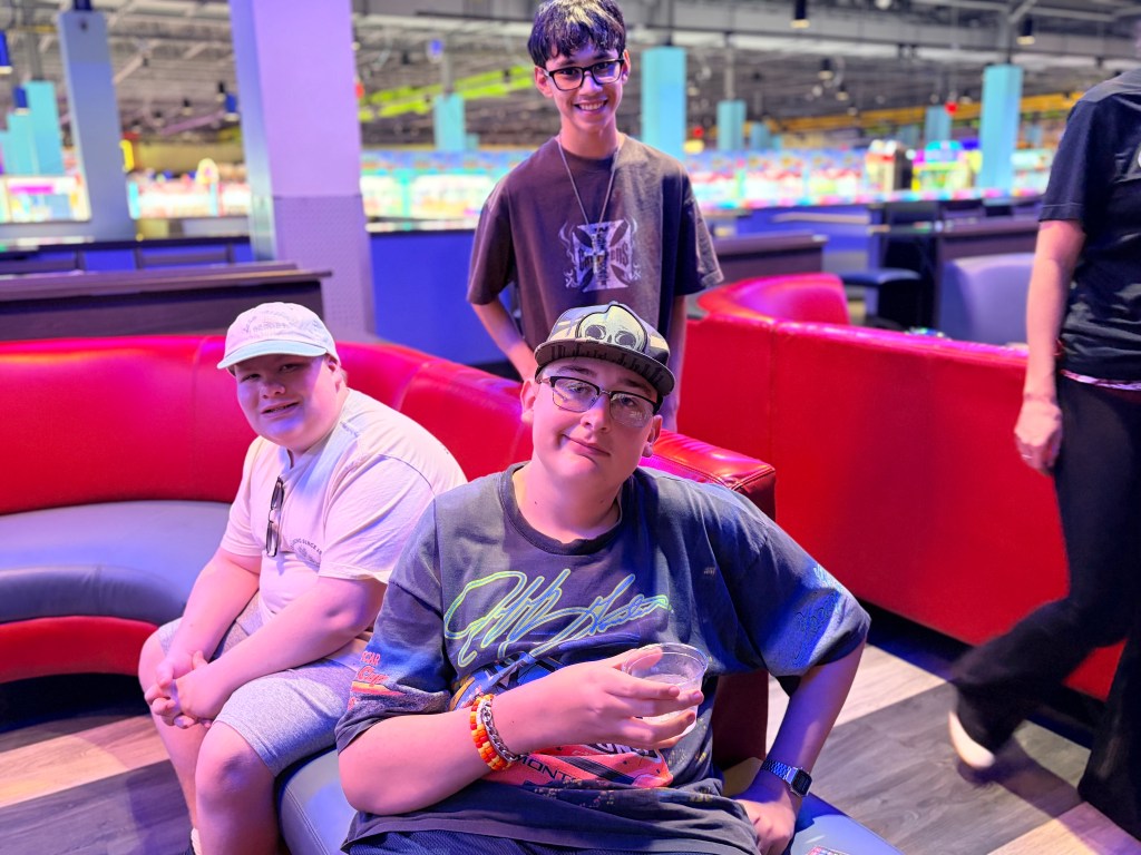 Sierra Gilbert students gather together during a community bowling outing at Round1.