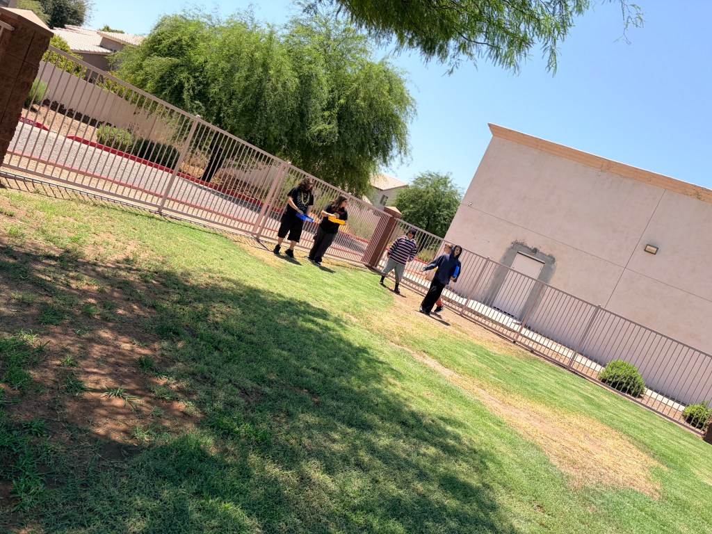 Students and staff enjoy an outdoor snowball activity during Fun Friday at Sierra School of Gilbert.