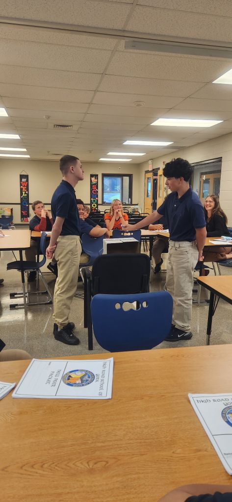 Students participating in a High Road Family Feud classroom activity