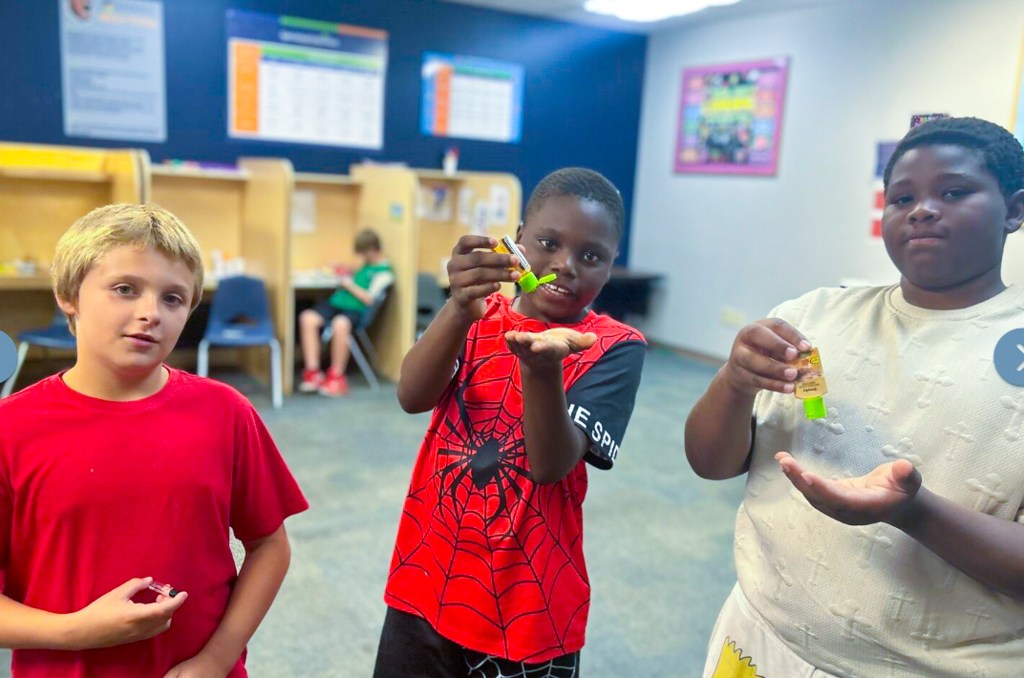 sierra School of Sacramento students participate in a hands-on classroom activity together.