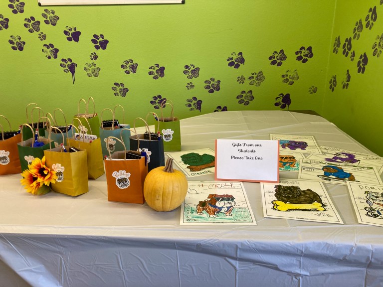 Gift bags and student artwork displayed during the district partner visit