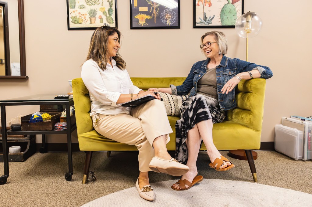 Bethany Ortega, School Director, meeting with Meaghan Torrence, Associate Director, at NewHope Academy