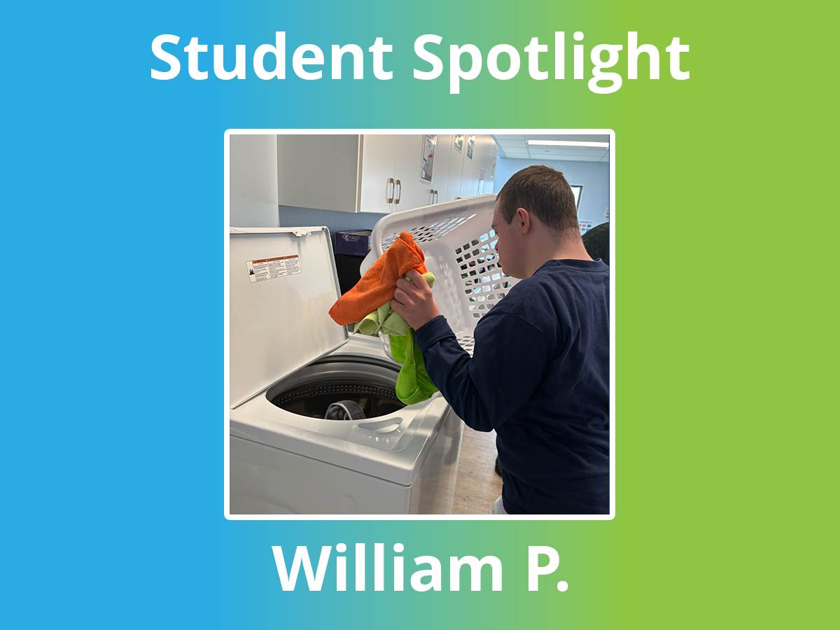 William completing a laundry task during a student learning activity at High Road School of East York.