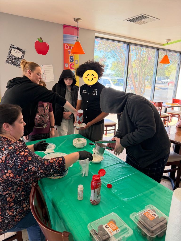 Sierra School of Solano County students and staff prepare spaghetti ice cream together during the Quarterly Admin Event.