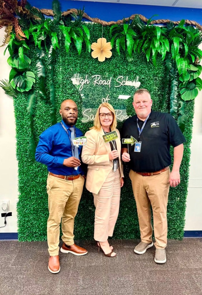 Carl Blackmon poses with colleagues at High Road School of Santa Rosa.