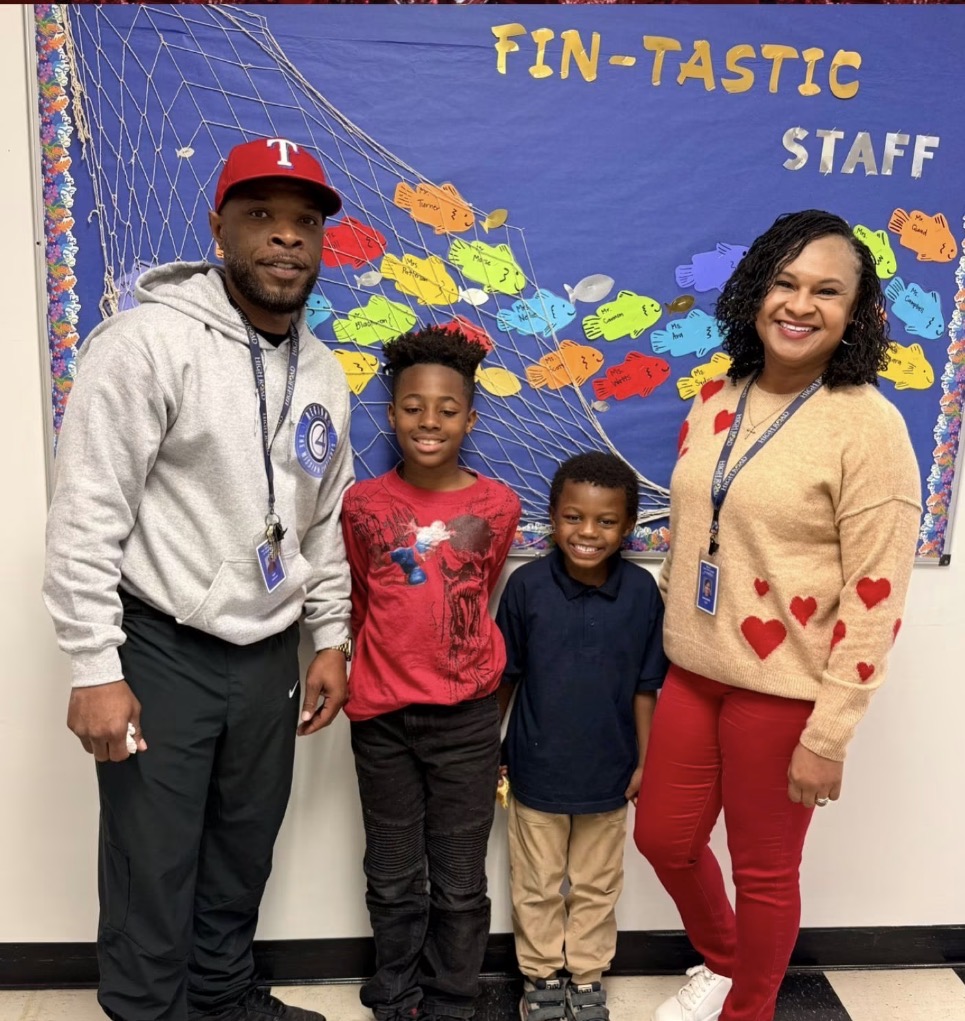 Carl Blackmon and a High Road School of Santa Rosa staff member pose with two students.