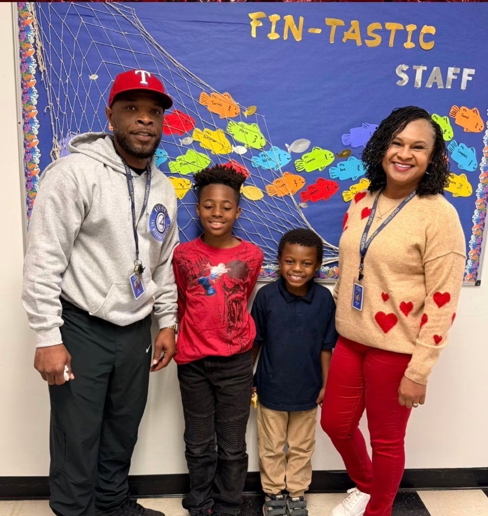 Carl Blackmon and a High Road School of Santa Rosa staff member pose with two students.