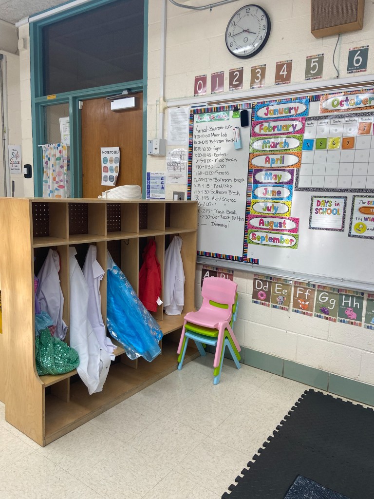 Early childhood classroom schedule, cubbies and learning materials at High Road School of the South Suburbs.