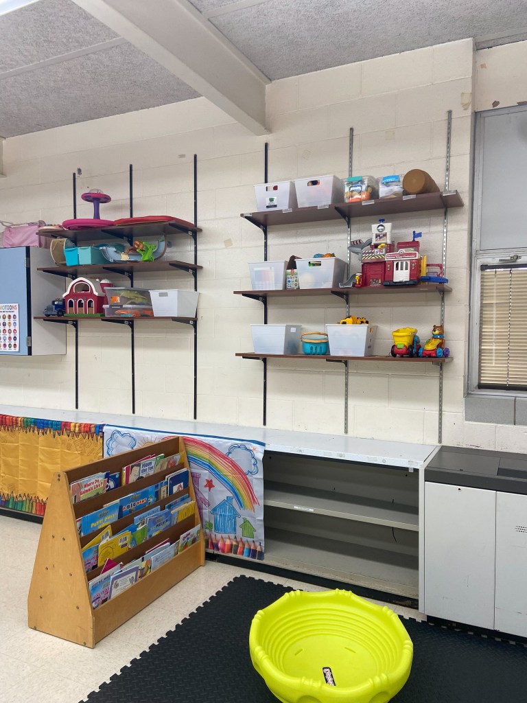 Toys, books and classroom materials organized for students in the High Road early childhood program.