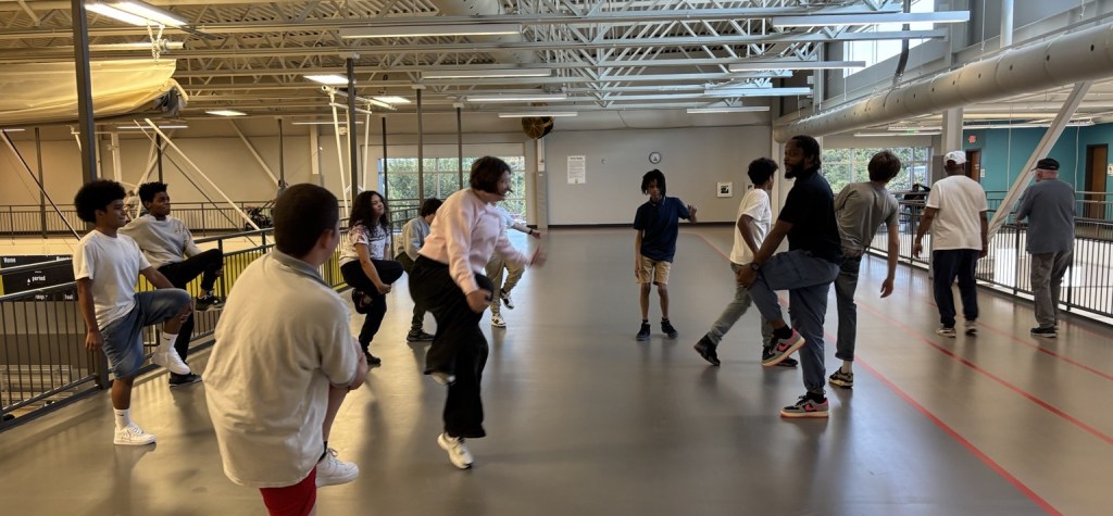 1. High Road School of Nashville students completing group exercises inside the Southeast Community Center.