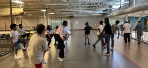 1. High Road School of Nashville students completing group exercises inside the Southeast Community Center.