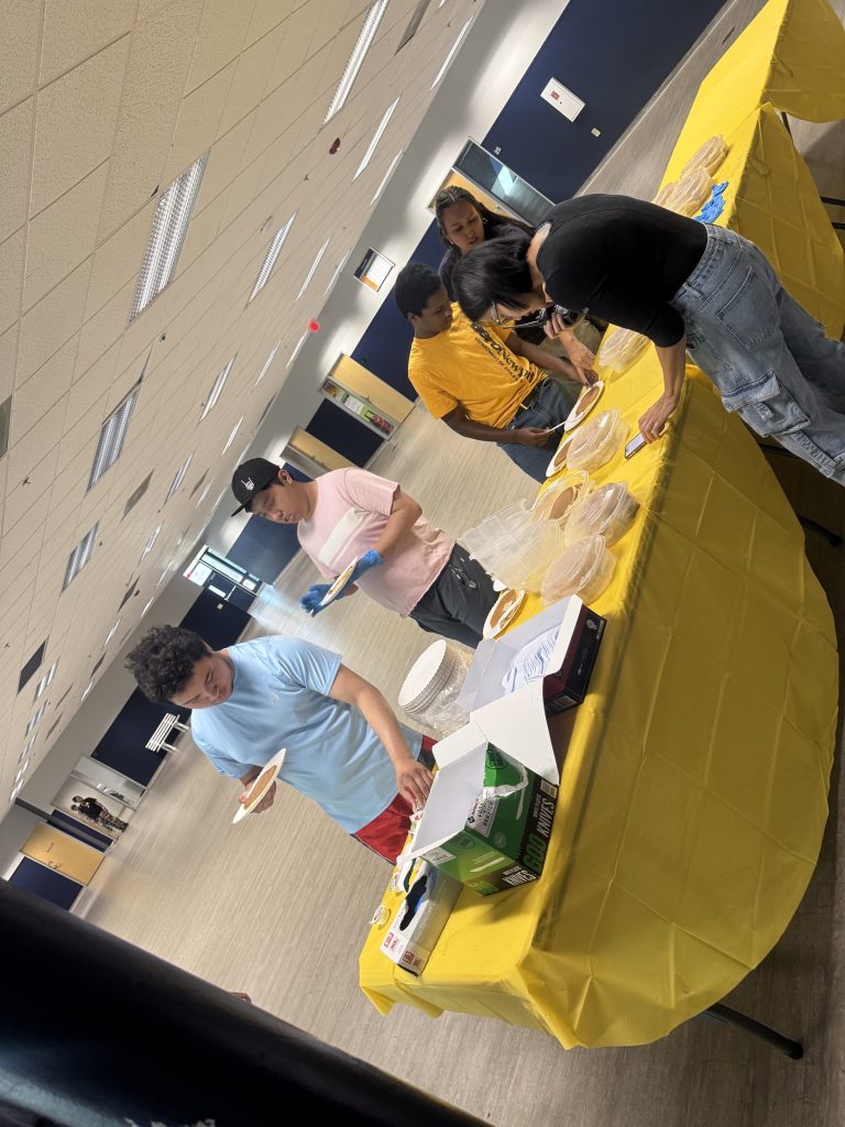 1. Students participating in a pancake breakfast celebration at Sierra School of Sacramento.