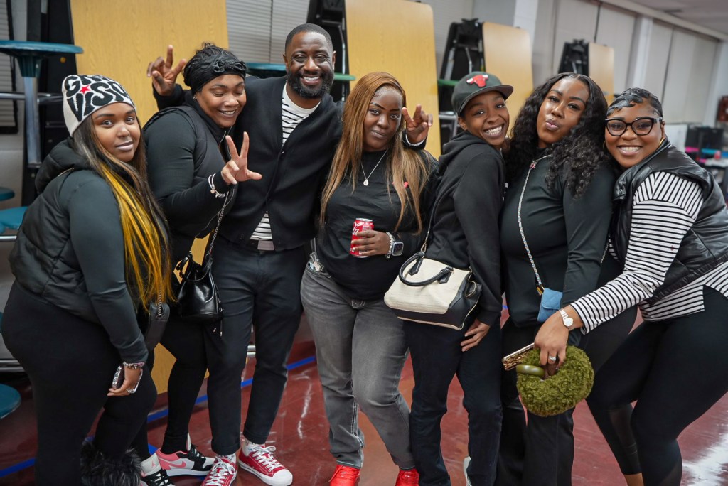 1. Excel Academy of Roseland staff posing together during the State of the School Address.