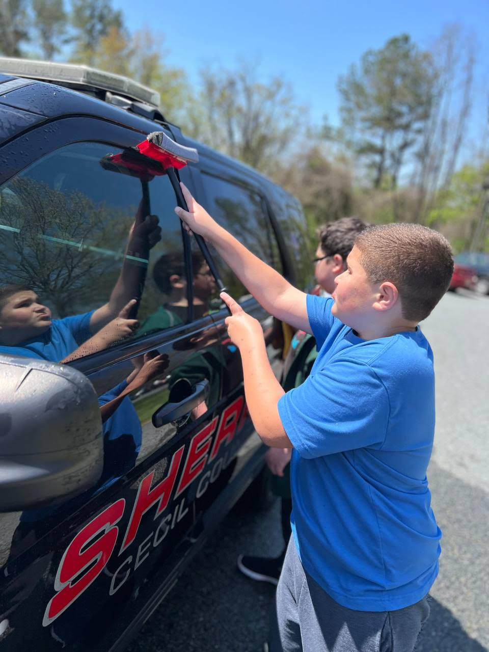 Students participating in the High Road School of Cecil County car wash - Photo 2