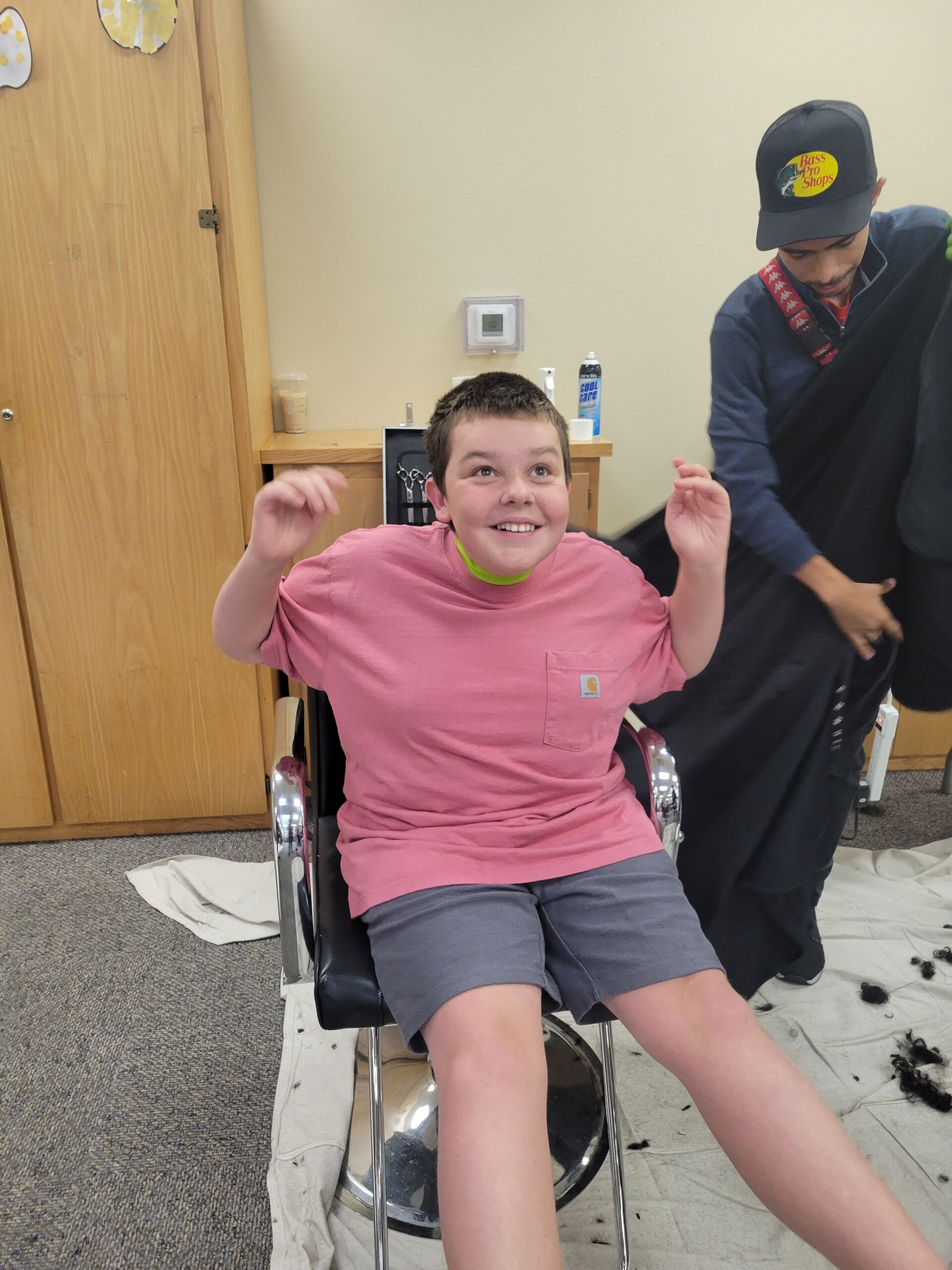 Students receiving haircuts - Image 10