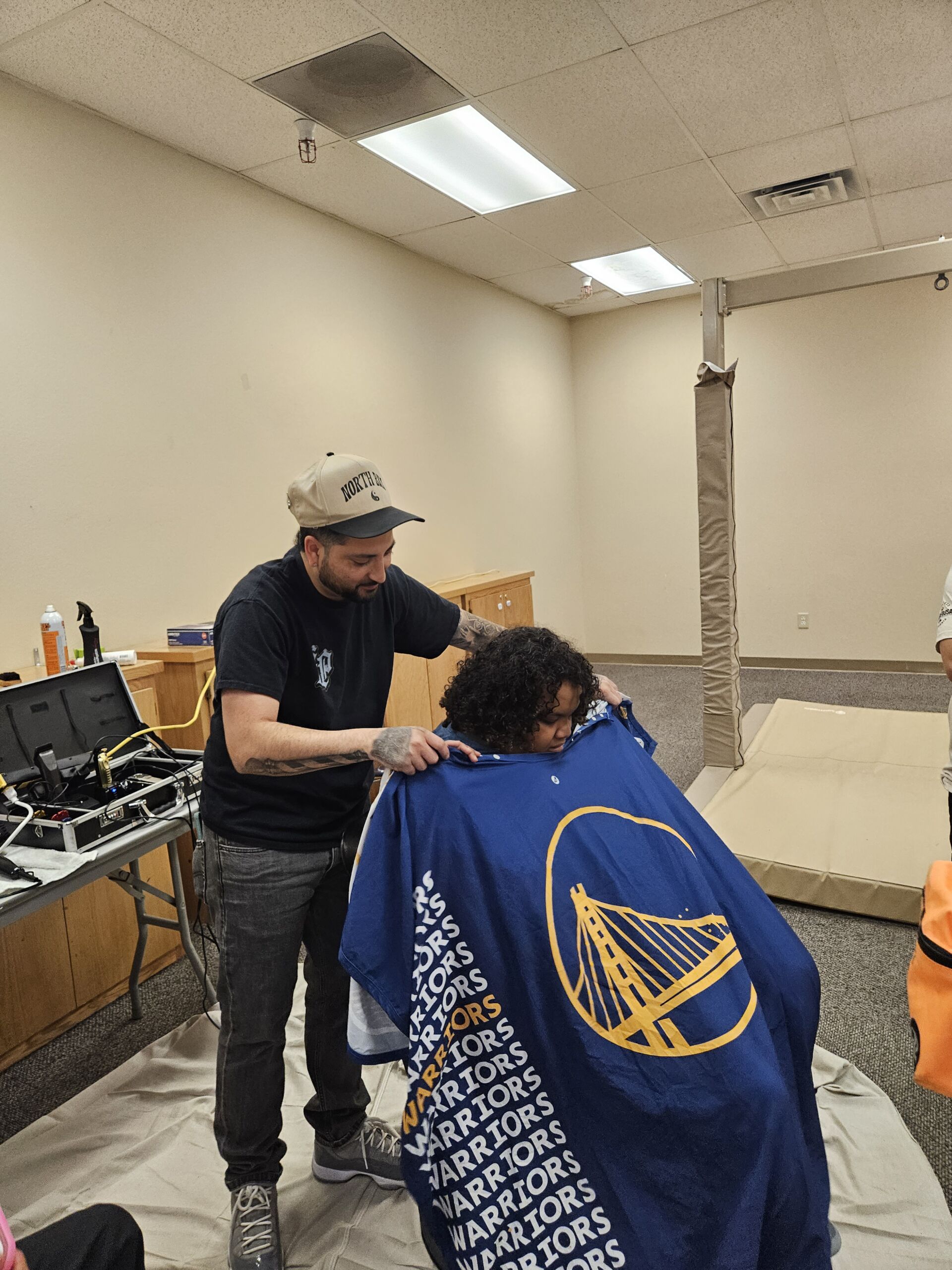 Students receiving haircuts - Image 5