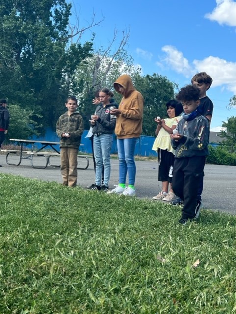 Students participating in the egg races - Photo 4