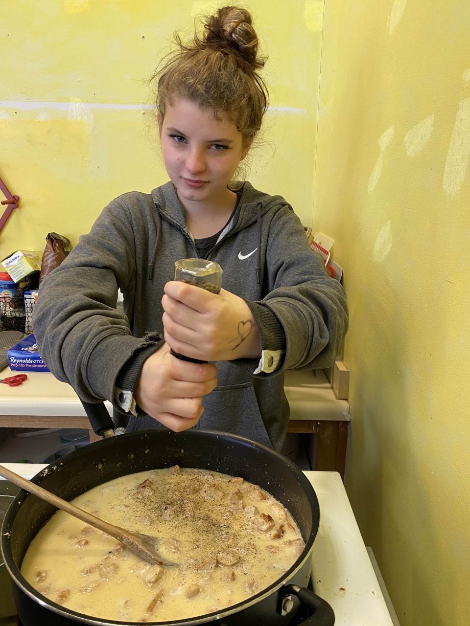 Students creating a grocery list and budgeting